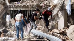 Families calling out to loved ones trapped in rubble by Venezuela quakes