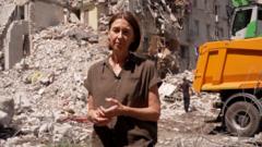 Watch: at site of deadly Russian attack on Kyiv flats