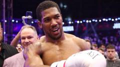 Joshua wins first fight since fatal Nigeria crash despite knockdowns