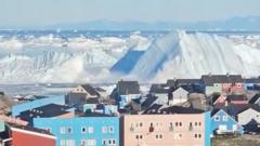 Watch: Giant iceberg turns over near Greenland’s coast