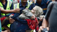97-year-old woman rescued after Nepali floods looked like ‘a warrior’